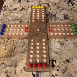 The MARBLE GAME: ( Refer to “ Custom Marble game for custom”)