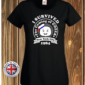 Ghostbusters t shirt marshmallow man black tshirt, navy film t shirt gift for film fan unisex, ladies fitted and childrens.