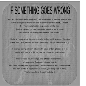 May include: A grey rectangular sign with rounded corners featuring black text that reads: IF SOMETHING GOES WRONG. The text continues with a message about business values, customer satisfaction, and a request for polite communication with Graeme.