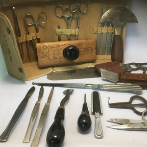Antique Medical Supplies with Med Dept USN Case with Haslam Tools Human Body Print Block Bone Saw F.A. Koch & Co Forceps Osbourne 1926