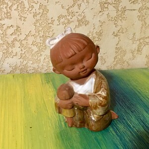Vintage Terracotta Figurine Sweet Face Little Girl Kneeling and Holding Doll