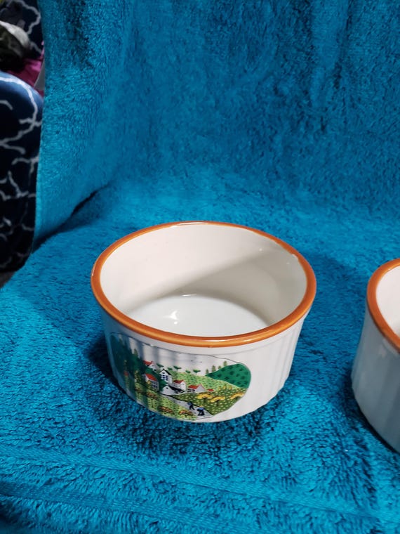 Country village ramekins set of 3  Newcore stoneware dishwasher and microwave safe in very good condition 4"x2" see picture.