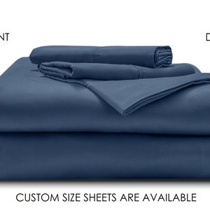 May include: A set of deep blue, 600 thread count bed sheets with 15 inch deep pockets. Custom size sheets are available.