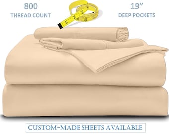 May include: A set of beige bed sheets, including a fitted sheet, flat sheet, and pillowcases. The image shows the text "800 thread count" and "19" deep pockets". The text "CUSTOM-MADE SHEETS AVAILABLE" is also visible.