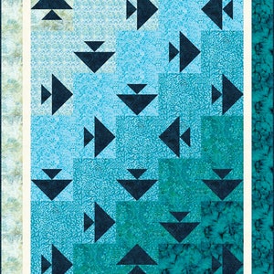 Under the Sea Lap Quilt Pattern features fish swimming in every direction.