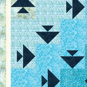 Under the Sea Lap Quilt Pattern features fish swimming in every direction.