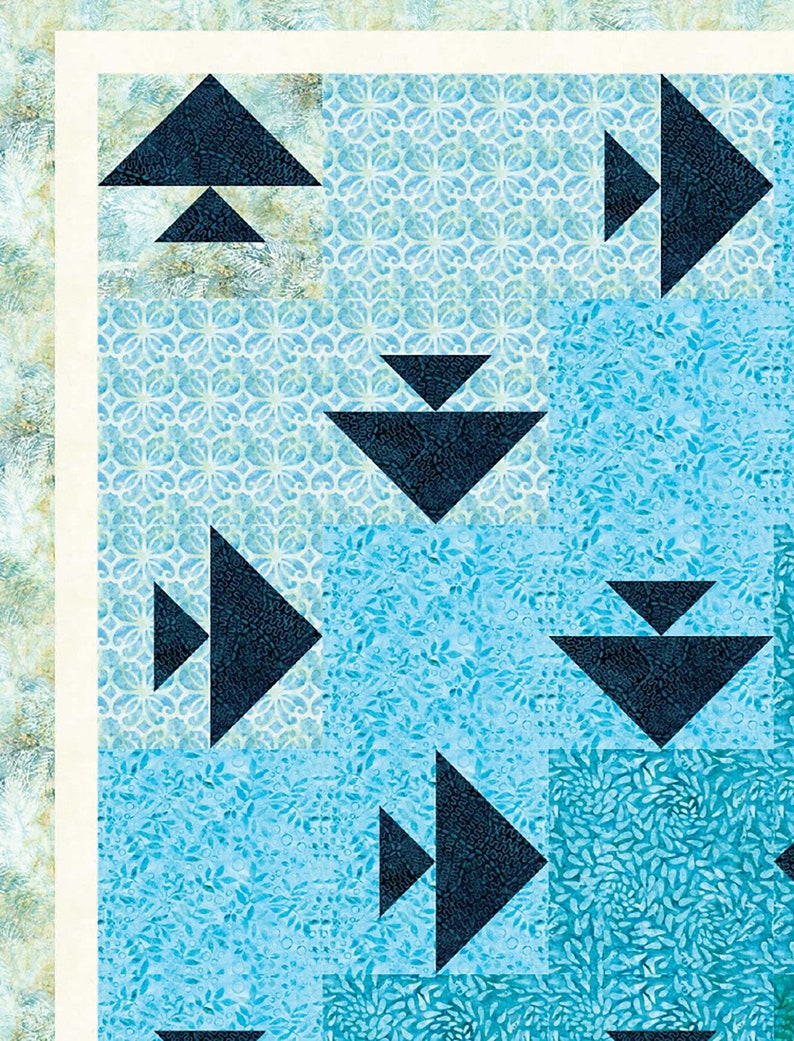 Under the Sea Lap Quilt Pattern features fish swimming in every direction.