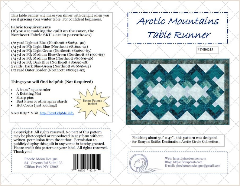 May include: Arctic Mountains Table Runner sewing pattern featuring a blue and white geometric design. The pattern is designed for Banyan Batiks Destination Arctic Circle Collection. The pattern finishes at approximately 30 inches by 47 inches.