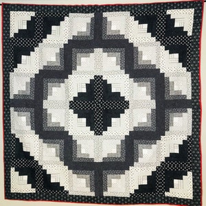 This traditional Lincoln Log Cabin Quilt Pattern is great for scraps or can be made in black and white as shown.