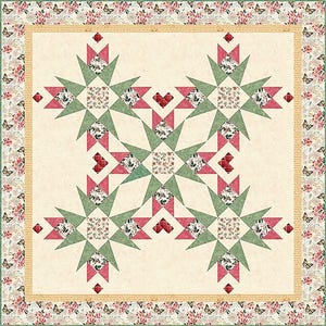 May include: A square quilt featuring a central star pattern composed of sage green, rose pink, and floral fabric patches. The design includes small red plaid heart accents and a border decorated with a repeating butterfly and floral print pattern.
