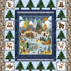 May include: A colorful quilt featuring a central scene of a mountain landscape with various animals, including deer, bears, and moose. The quilt is bordered by images of trees, animals, and a wood-grain pattern, creating a cozy, nature-themed design.