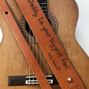 Unleash the power of personalization – because your music is as unique as your handwriting. Order your custom leather guitar strap with your actual handwriting today!