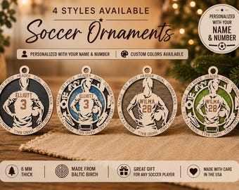May include: Four circular wooden soccer ornaments featuring a player silhouette with the name ELLIOTT or WILMA and a jersey number. The border includes soccer terms like header, goal, corner kick, yellow card, hand ball, penalty kick, and tackle.