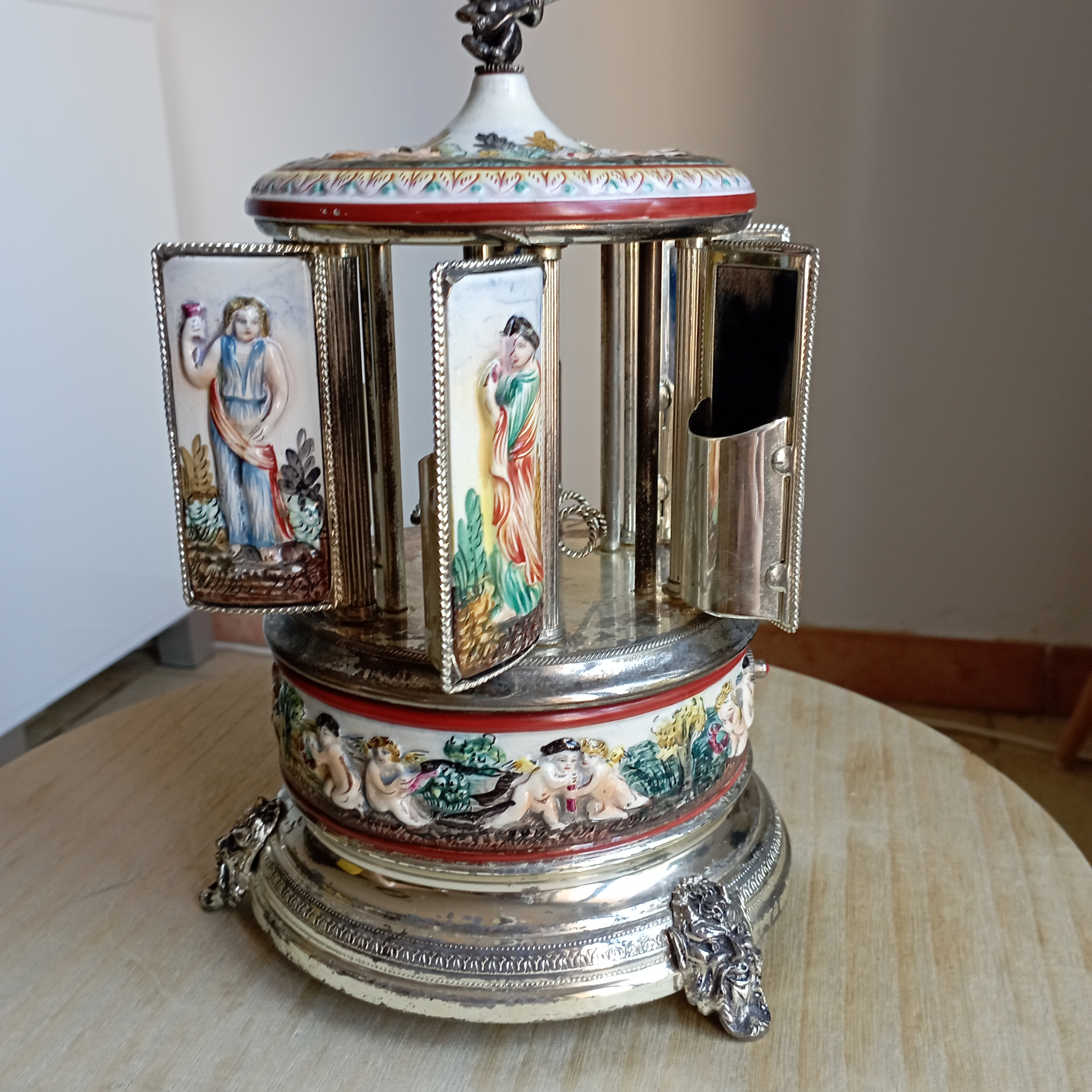 A Reuge Porcelain And Silver Plate Cigarette/lipstick Carousel Music Box  Auction
