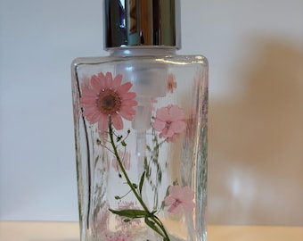 Pretty pastel dried and pressed flowers decorate this foam soap dispenser