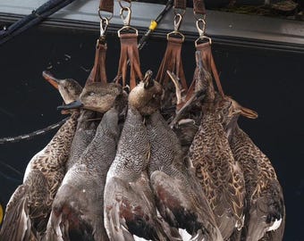 alças de suporte de pato feitas à mão.