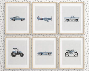 May include: Six framed prints featuring illustrations of vehicles. The prints depict a blue car, a plane with red stars, a pickup truck, a tractor, a convertible, and a motorcycle. Each illustration is set against a light gray background.