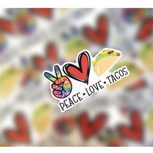 May include: Peace, love, and tacos sticker with a peace sign, heart, and taco graphic. The peace sign is rainbow tie-dye, the heart is red, and the taco is yellow with green lettuce and brown meat.