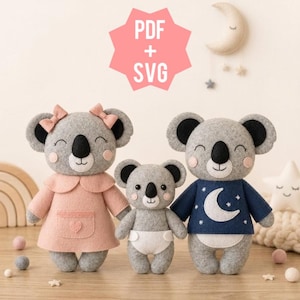 May include: Three gray felt koala plush toys. The left koala wears a pink dress with a pocket. The center koala wears a white diaper. The right koala wears a navy blue shirt with a white moon and stars. A pink star graphic reads PDF + SVG.