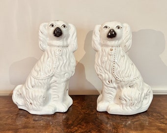 Large pair of Victorian seated Staffordshire spaniel dogs