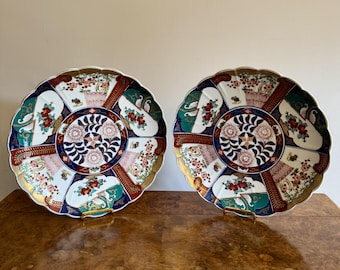 Par de cargadores imari japoneses antiguos de calidad