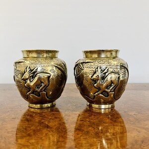 Unusual pair of antique Chinese brass jardinieres