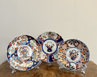 Quality collection of three large antique Japanese imari plates