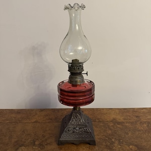 Pretty antique Victorian cranberry glass oil lamp