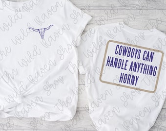 May include: Two white t-shirts with a blue design. The front of one shirt features a bull skull. The back of the other shirt features a brown rope border around the text "COWBOYS CAN HANDLE ANYTHING HORNY".