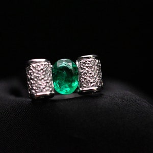 Oval Colombian Emerald in a Diamond Ribbon 18k White Gold Setting