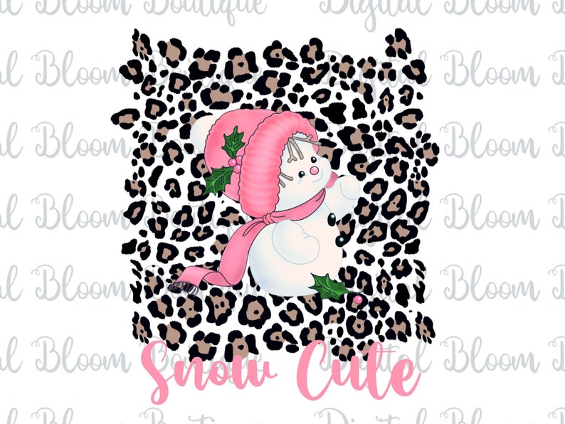 May include: A pink and white snowman wearing a pink hat and scarf, with a green holly sprig, on a black and white leopard print background. The text "Snow Cute" is written below the snowman.