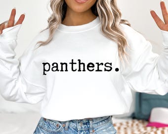 May include: White sweatshirt with black text that reads "panthers."