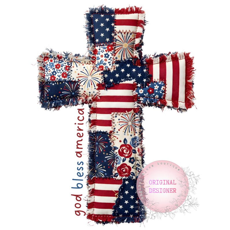 May include: A patriotic cross-shaped decoration with a patchwork design. The cross features red, white, and blue fabrics with stars, stripes, and floral patterns. The text "god bless america" is printed vertically on the left side.