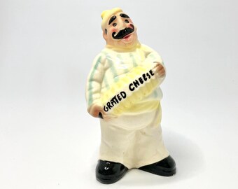 Grated Cheese Shaker Featuring Italian Man Holding an Accordian.