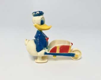 Vintage Donald Duck with Wheelbarrow Ramp Walker Toy.