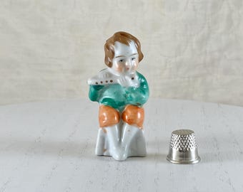 Occupied Japan 2-3/4-inch Vintage 1950s Figurine of Boy Playing Flute.