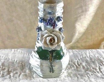 German 1920-1940's Elfin Ware 3-1/2" tall vase with porcelain flowers and leaves and a basket weave pattern with luster glaze.