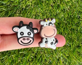 crocs with cows on them