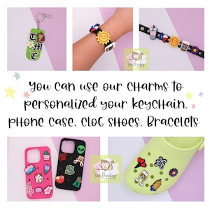 May include: A collection of charms for personalization. The image shows a green keychain, a black bracelet with a yellow sun charm, phone cases, and a lime green clog shoe, all decorated with various charms. Text on the image says "You can use our charms to personalize your keychain, phone case, clog shoes, bracelets."