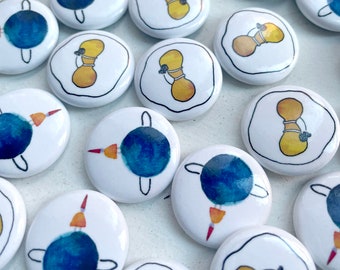 Pinback Buttons - Tiny Planet & Yolk Hug, 2 Pin Set, Person on Tiny Planet, Girl Hugging Egg Yolk