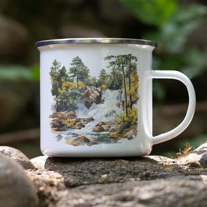 a coffee cup sitting on top of a rock