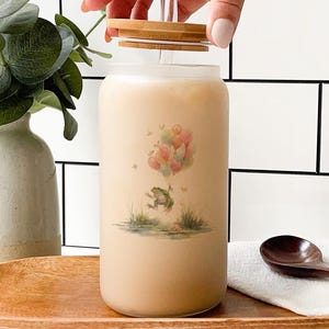 Whimsical Frog Balloon Glass Tumbler – Cute Floating Frog Over Pond Cup – Aesthetic Animal Drinkware Gift for Nature Lovers