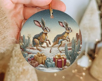 Jackalope Christmas Ornament – Snowy Desert Holiday Scene with Jackalopes & Gifts – Ceramic Tree Decoration