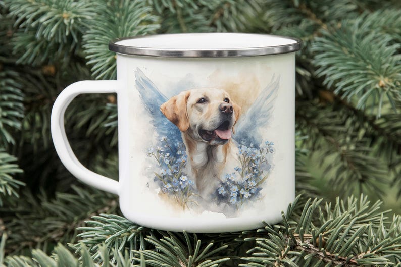 A white enamel mug with a printed image of a yellow Labrador retriever dog surrounded by blue flowers, placed on top of pine needles.