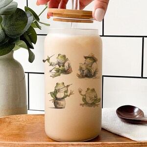 Cute Frog Glass Tumbler – Funny Cartoon Frog Reading Newspaper, Playing Music – Kawaii Animal Cup, Gift for Frog Lovers