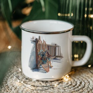 Snowshoes Porch Railing Enamel Camping Mug – Rustic Winter Tin Cup, Outdoorsy Hiker Gift, Cabin Coffee Mug