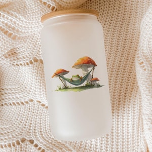 Frog in Hammock Glass Tumbler – Cute Mushroom Aesthetic Iced Coffee Cup, Cottagecore Toadstool Drinkware Gift