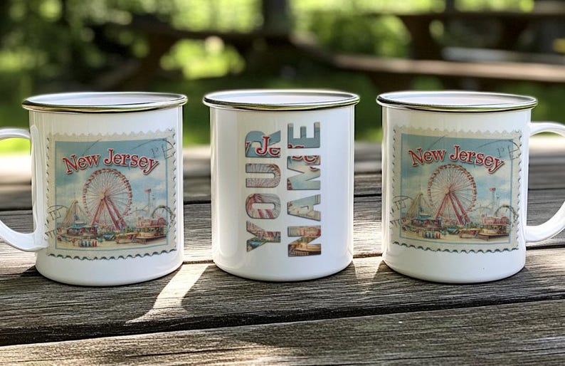 three coffee mugs sitting on top of a wooden table