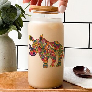 a bottle with a picture of a rhino on it