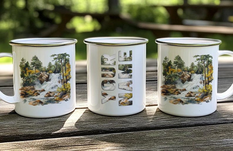 three coffee mugs sitting on top of a wooden table
